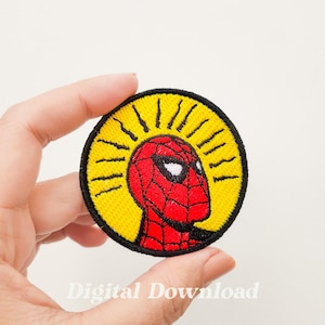 May include: Embroidered patch featuring Spider-Man's head in a yellow circle with black rays. The patch is red, black, and yellow. The text "Digital Download" is at the bottom.