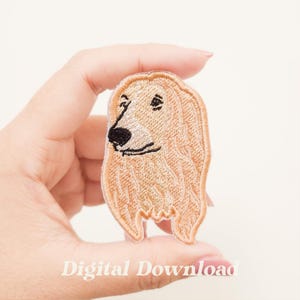 May include: Embroidered patch featuring a golden retriever dog with a black nose and eyes. The patch has a detailed, textured appearance. The text "Digital Download" is visible at the bottom. This patch is suitable for jackets, bags, or other fabric items.