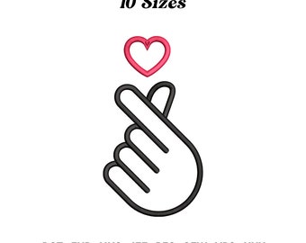 May include: An embroidered design featuring a hand gesture forming a heart shape with a red heart above it. The text "10 Sizes" is above the design. Below the design are the file types: DST, EXP, HUS, JEF, PES, SEW, VP3, and XXX.