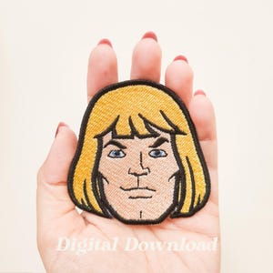 May include: Embroidered patch featuring the face of a cartoon character with blonde hair, blue eyes, and a determined expression. The patch has a yellow border and is held in a hand. The text "Digital Download" is visible at the bottom.