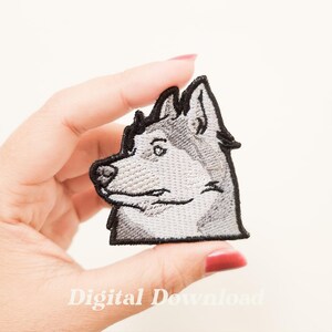 May include: Embroidered patch featuring a side profile of a gray and black husky dog. The patch has a black border and detailed stitching, showcasing the dog's features. The text "Digital Download" is at the bottom.
