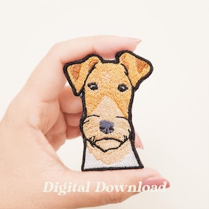 May include: Embroidered patch featuring a dog's head with tan and white fur, outlined in black. The patch has a detailed design and the text "Digital Download" at the bottom. This patch is likely for clothing or accessories.