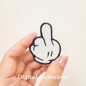 May include: White embroidered patch of a hand giving the middle finger, with black outlines. The patch is being held by a hand.