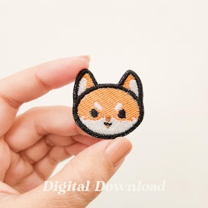 May include: Embroidered iron-on patch featuring a cartoon Shiba Inu dog with orange fur, black eyes, and a white muzzle. The patch has a black outline.