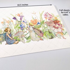 The image is a watercolor painting depicting three fairy characters surrounded by flowers and plants.