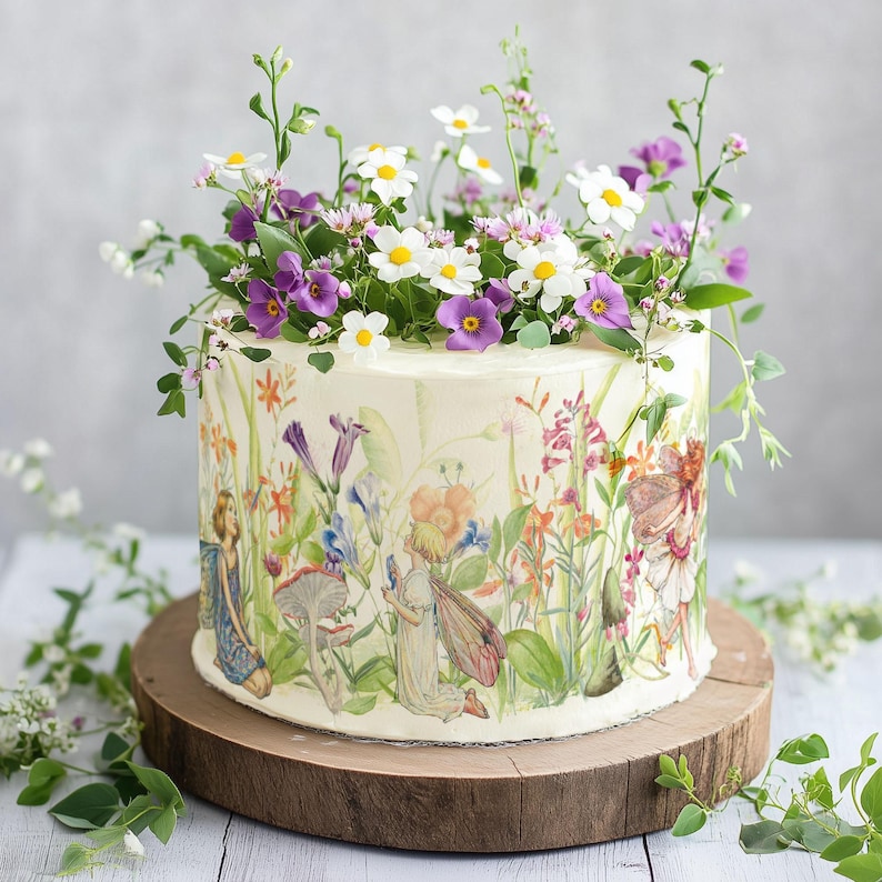 A beautifully decorated cake adorned with a variety of colorful flowers and leaves, creating a vibrant and natural-looking arrangement.