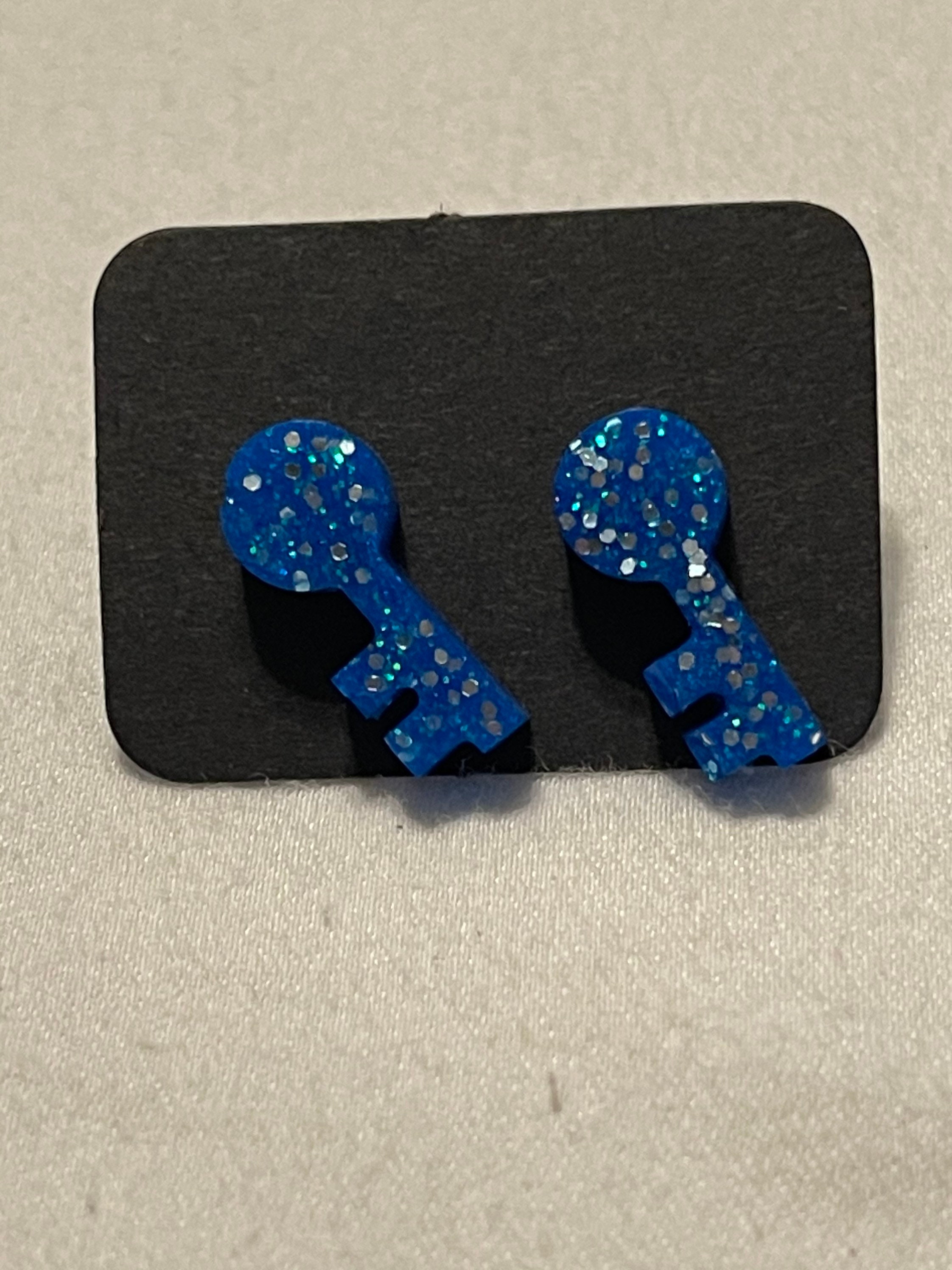 Blue and glittery key earrings Etsy