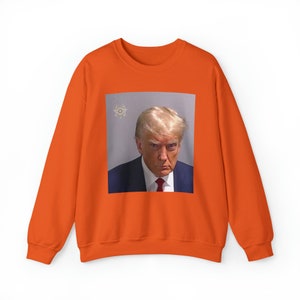 Premium Trump Mugshot Commemorative T-shirt Indictment Unisex Heavy Blend™ Crewneck Sweatshirt