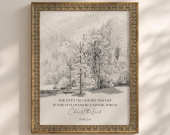 Puede incluir: Una impresión de arte enmarcada que presenta un boceto a lápiz en blanco y negro de un paisaje forestal con montañas. El texto dice: For unto you is born this day in the city of David a savior, who is Christ the Lord. Luke 2:11.