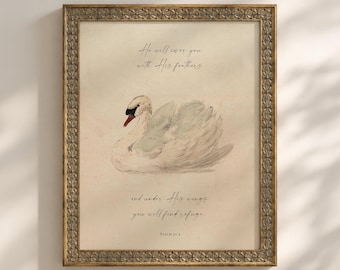 Könnte beinhalten: Ein gerahmter Kunstdruck mit einer Aquarellillustration eines weißen Schwans. Der Text lautet: He will cover you with His feathers and under His wings you will find refuge. Psalm 91:4. Der Rahmen hat eine metallische, strukturierte Oberfläche.