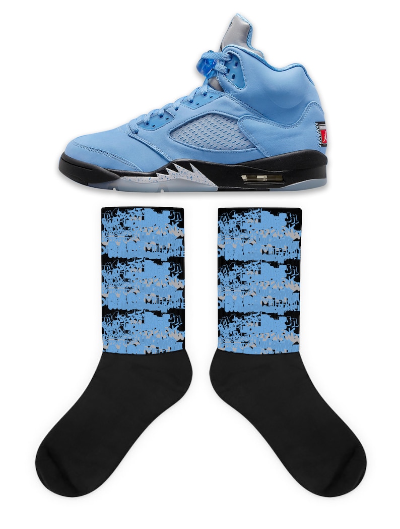 May include: A pair of light blue and black sneakers with a white sole. The sneakers are paired with a pair of black socks with a light blue and gray pattern.