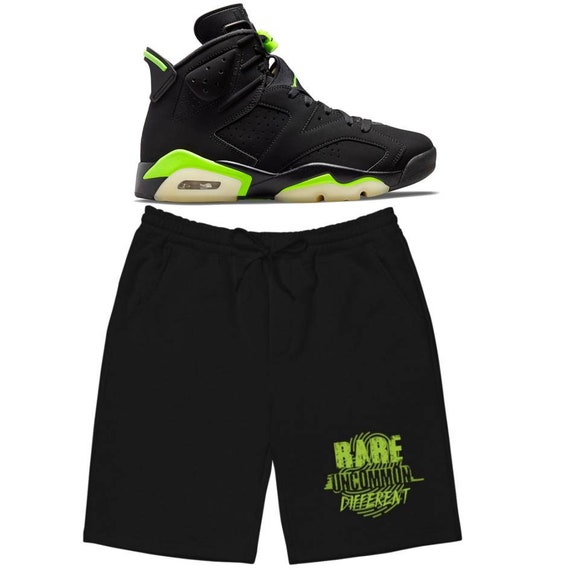 black and lime green jordan shorts
