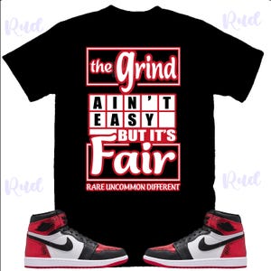 May include: Black t-shirt with the text "the Grind Ain't Easy But It's Fair" in red and white. The shirt is paired with red, black, and white high-top sneakers.