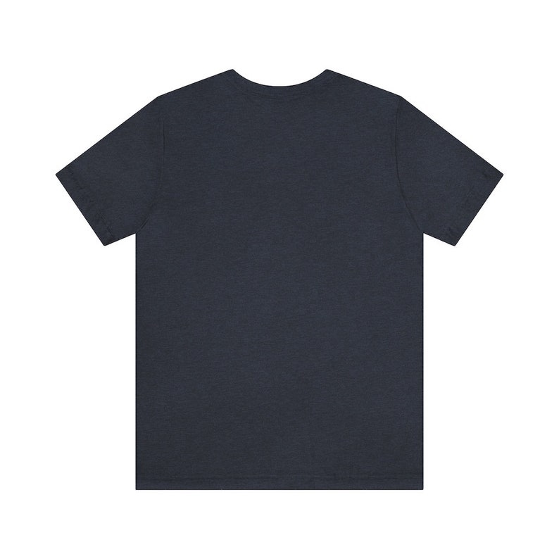 May include: A dark blue short-sleeved t-shirt.