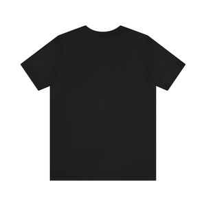 May include: A black short-sleeved t-shirt.