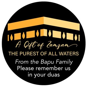 May include: A black circular sticker with gold and white text and a gold illustration of a building. The text reads "A Gift of Zamzam, THE PUREST OF ALL WATERS, From the Bapu Family, Please remember us in your duas."
