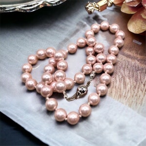 Shell Pearl Necklace, Pink. Hand Knotted on Matching Silk Cord. Silver tone Ball-shaped Slide Clasp. 18” #1476