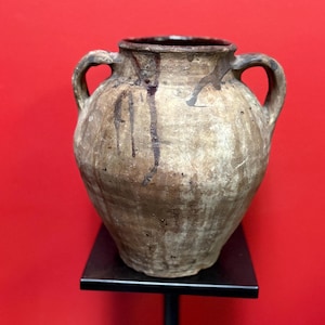 Approximately pre-10 century South American earthenware pot — some damage — see photos - museum quality — 10 inches tall - simplistic beauty
