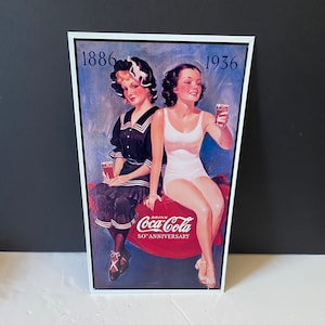 Vintage tin coke sign advertising