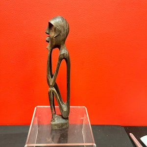 Lovely African 11 inch high stylized statue — wooden older beauty— perfect condition