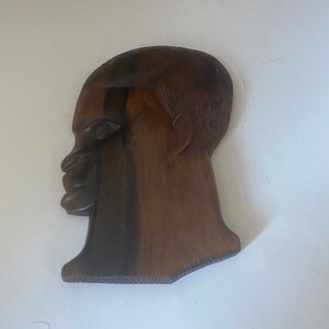 Vintage hanging Western African hardwood plaque of a man