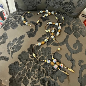 Absolutely epic African  approx  65 inch long stone and beaded necklace — bronze masks on ends — wow wow — tribal beauty