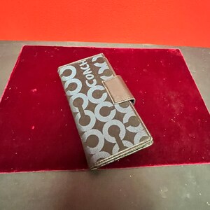 7 x 4” coach purse