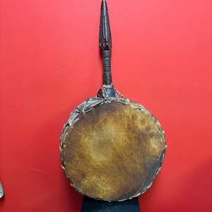 Fabulous 27 x 13” wide 19 century African ceremonial drum with great sound— good condition and wonderful piece of African history