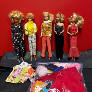Five vintage Barbie dolls with xtra clothes — great set — great value —