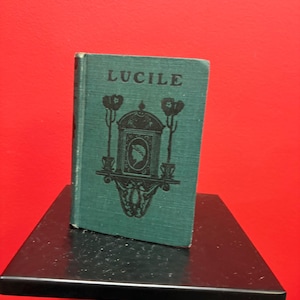 Antique copy of LUCILE  — pretty good condition by Owen Meredith— lovely cover