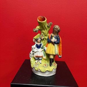 Beautiful 8  inch Staffordshire statue  of a couple with animal— chip — unusual imagery — mid 19 century -B