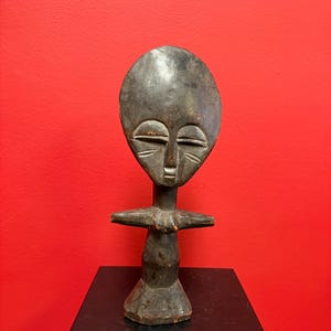 Beautiful African authentic Ashanti doll — 11 inches high and a tribal beauty — nice patina — good antique condition