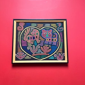 A  17 x 14” high fabulous South American mola on frame — wonderful detail and quality — great imagery