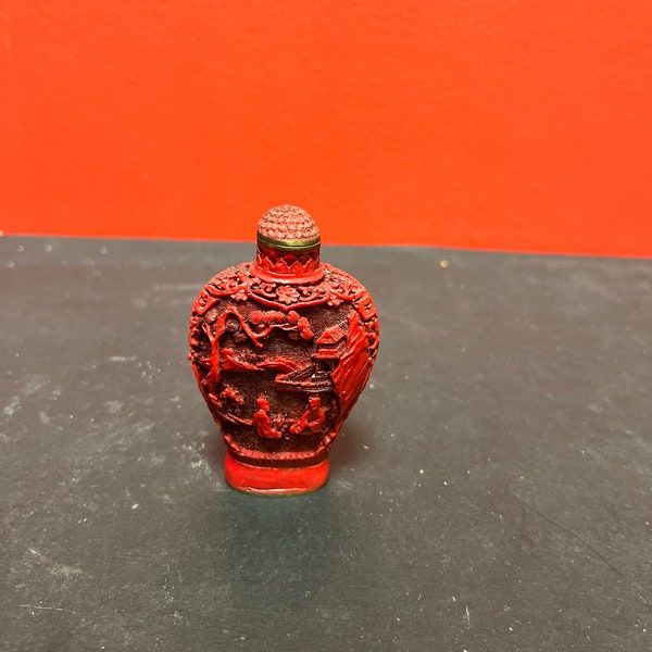 A  Chinese 3 inch high well detailed cinnabar  snuff bottle — great condition, but top is stuck. — low price
