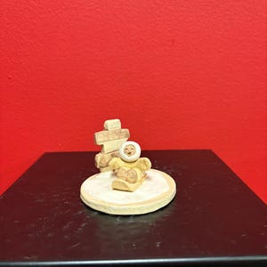 Beautiful Canadian indigenous Inuit signed clay statue of Eskimo and Inukshuk— handmade — approx 3”  high — perfect condition — great gift