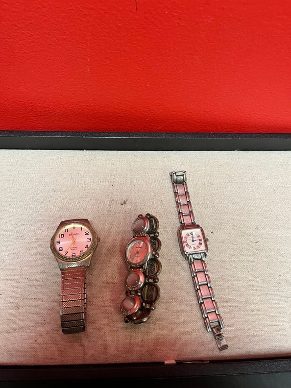 A  Nice lot of three designer watches as is -Great