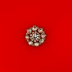A Beautiful 1.25 inch Gold-tone and Rhinestone Brooch