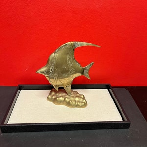 9 inch tall heavy brass fish on stand