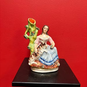 Beautiful 8  inch Staffordshire statue  of a lady with animal— good condition — unusual imagery — mid 19 century -B