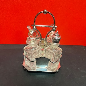 Stunning 9 inch high antique crystal and silver plate cruet set — great condition with one tiny chip