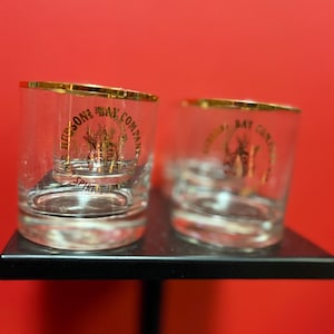 Beautiful set four 3 1/2 inch high Hudson Bay Company scotch whiskey glasses— HBC Canadian history— good condition —