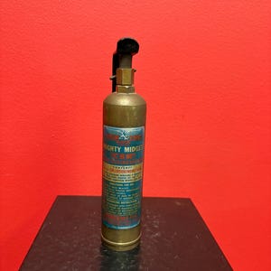 Antique 8 inch mighty midget fire extinguisher— salesman sample — empty — so cool