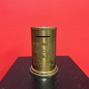 Crazy cool 1950s brass Las Vegas 4 1/2 inch tall money bank—