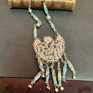 Approximately 26 inch necklace with 6 inch pendant — Asian silver filagree and pottery beads — very unusual and wonderful