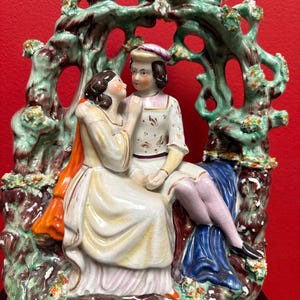 Beautiful 11 inch Staffordshire statue of Romeo and Juliet— 1850s— good condition with a couple little nicks — great imagery