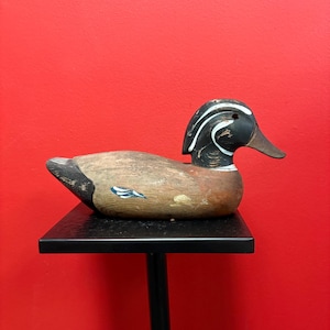 Beautiful antique 11 inch long Canadian wood duck decoy statue with great Patina