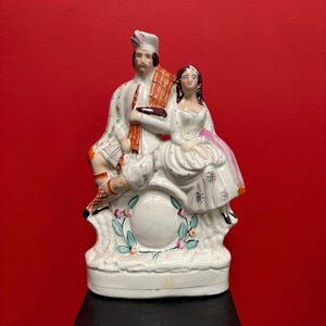 Beautiful antique English Staffordshire flatback statue of a couple — 14 x 8” wide — good condition for age