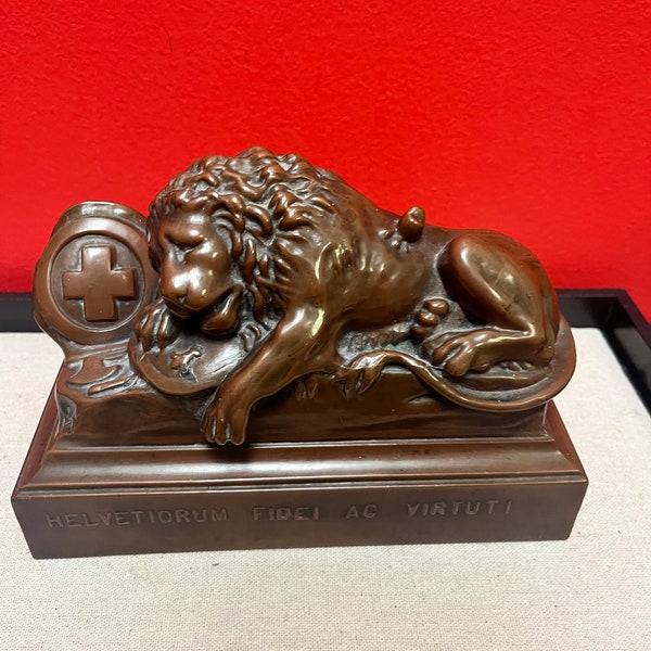 A  7 1/2 x 6 x 3” high fabulous antique Swiss bronze lion— heavy and beautifully detailed— probably bought on a grand tour — wow