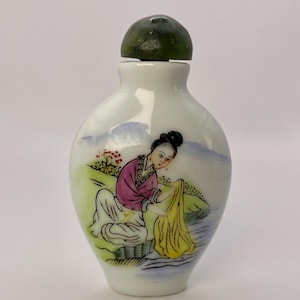 Chinese hand painted porcelain snuff bottle with jade top – Signed