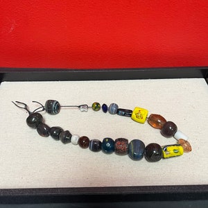 Cool collection of glass trade beads  — good for crafting or jewelry making —